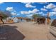 Backyard with various outbuildings and open space at 21543 W Church Ave, Wittmann, AZ 85361