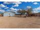 Large backyard with patio and storage shed at 21543 W Church Ave, Wittmann, AZ 85361