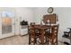 Small dining area with wood table and chairs at 21543 W Church Ave, Wittmann, AZ 85361