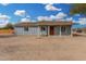 Single story home with front porch and yard at 21543 W Church Ave, Wittmann, AZ 85361