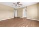 Bedroom with wood floors and ceiling fan at 23242 S 202Nd Way, Queen Creek, AZ 85142