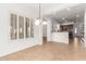 Bright dining room with a view into kitchen at 23242 S 202Nd Way, Queen Creek, AZ 85142