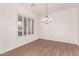 Simple dining room with hardwood floors and window at 23242 S 202Nd Way, Queen Creek, AZ 85142