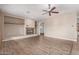 Living room with fireplace and access to other rooms at 23242 S 202Nd Way, Queen Creek, AZ 85142