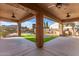 Large covered patio overlooks the backyard pool and landscape at 23242 S 202Nd Way, Queen Creek, AZ 85142