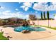 Inviting kidney shaped pool with waterfall feature at 23242 S 202Nd Way, Queen Creek, AZ 85142