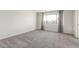 Spacious bedroom with large window and plush carpeting at 2524 S El Paradiso -- # 76, Mesa, AZ 85202