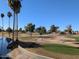 Golf course with pond and landscaping at 2524 S El Paradiso -- # 76, Mesa, AZ 85202