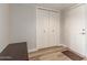 Hallway with double doors and wood flooring at 2524 S El Paradiso -- # 76, Mesa, AZ 85202