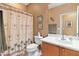 Clean bathroom with shower/tub combo and updated vanity at 26171 W Via Del Sol Dr, Buckeye, AZ 85396