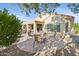 Relaxing backyard patio with fire pit and seating area at 26171 W Via Del Sol Dr, Buckeye, AZ 85396