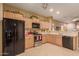 Modern kitchen featuring stainless steel appliances and ample cabinetry at 26222 W Behrend Dr, Buckeye, AZ 85396