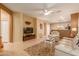 Spacious living room with a view into the kitchen at 26222 W Behrend Dr, Buckeye, AZ 85396