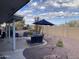 Landscaped backyard with patio and seating at 2705 S Copperwood --, Mesa, AZ 85209