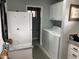 Convenient laundry room with washer, dryer, and extra storage at 2705 S Copperwood --, Mesa, AZ 85209