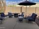 Patio furniture with umbrella and fire pit at 2705 S Copperwood --, Mesa, AZ 85209