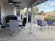 Covered patio with table and chairs at 2705 S Copperwood --, Mesa, AZ 85209