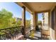 Private balcony with wrought iron railing and outdoor seating at 2746 S Harmony Ave, Gilbert, AZ 85295