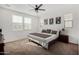 Bright bedroom with a large bed and ample natural light at 2746 S Harmony Ave, Gilbert, AZ 85295