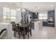 Open concept dining area with kitchen view at 2746 S Harmony Ave, Gilbert, AZ 85295