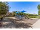 Community playground with shade umbrellas and play equipment at 2746 S Harmony Ave, Gilbert, AZ 85295