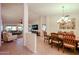 Formal dining room with chandelier and hardwood table at 2747 Leisure World --, Mesa, AZ 85206