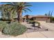 Single story home with desert landscaping and a two-car garage at 2747 Leisure World --, Mesa, AZ 85206