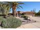 Single story home with desert landscaping and a two-car garage at 2747 Leisure World --, Mesa, AZ 85206