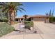 Single story home with desert landscaping and a two-car garage at 2747 Leisure World --, Mesa, AZ 85206