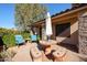 Covered patio with stone tile flooring and outdoor seating at 2747 Leisure World --, Mesa, AZ 85206