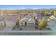 Aerial view of single-story house with desert landscaping, two-car garage, and mountain views at 28210 N Gedona Way, San Tan Valley, AZ 85143