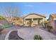 Backyard patio, putting green and landscaping at 28210 N Gedona Way, San Tan Valley, AZ 85143