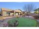 Putting green and patio in the backyard of the house at 28210 N Gedona Way, San Tan Valley, AZ 85143