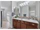 Double vanity bathroom with a walk-in shower at 28210 N Gedona Way, San Tan Valley, AZ 85143