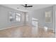 Bright bedroom with herringbone floors and window shutters at 28210 N Gedona Way, San Tan Valley, AZ 85143