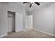 Bedroom with carpet, ceiling fan and sliding closet doors at 28210 N Gedona Way, San Tan Valley, AZ 85143