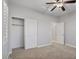 Spacious bedroom with carpet flooring and a large closet at 28210 N Gedona Way, San Tan Valley, AZ 85143