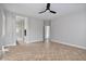 Large bedroom with herringbone floors and ceiling fan at 28210 N Gedona Way, San Tan Valley, AZ 85143