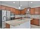 Modern kitchen with granite countertops and stainless steel appliances at 28210 N Gedona Way, San Tan Valley, AZ 85143