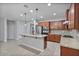 Modern kitchen with granite countertops and stainless steel appliances at 28210 N Gedona Way, San Tan Valley, AZ 85143