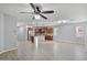 Spacious living room with tile floors and ceiling fan at 28210 N Gedona Way, San Tan Valley, AZ 85143