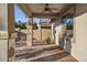 Covered patio with ceiling fan, offering shade and relaxation at 28210 N Gedona Way, San Tan Valley, AZ 85143