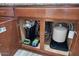 Under-sink area with water filtration system at 28210 N Gedona Way, San Tan Valley, AZ 85143