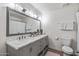 Elegant bathroom with a double vanity and marble countertops at 2826 E Victor Hugo Ave, Phoenix, AZ 85032