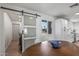 Dining area with a wooden table and chairs, near kitchen and laundry room at 2826 E Victor Hugo Ave, Phoenix, AZ 85032