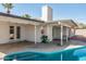 Large kidney shaped pool with spacious patio area at 2826 E Victor Hugo Ave, Phoenix, AZ 85032