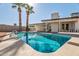 Inviting rectangular pool in a sunny backyard with palm trees at 2826 E Victor Hugo Ave, Phoenix, AZ 85032