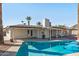 Relaxing backyard oasis featuring a sparkling pool and spacious patio at 2826 E Victor Hugo Ave, Phoenix, AZ 85032