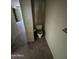 Small toilet area with tile flooring at 2835 N 49Th St, Phoenix, AZ 85008