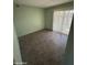 Spacious bedroom with tile flooring and sliding door access at 2835 N 49Th St, Phoenix, AZ 85008